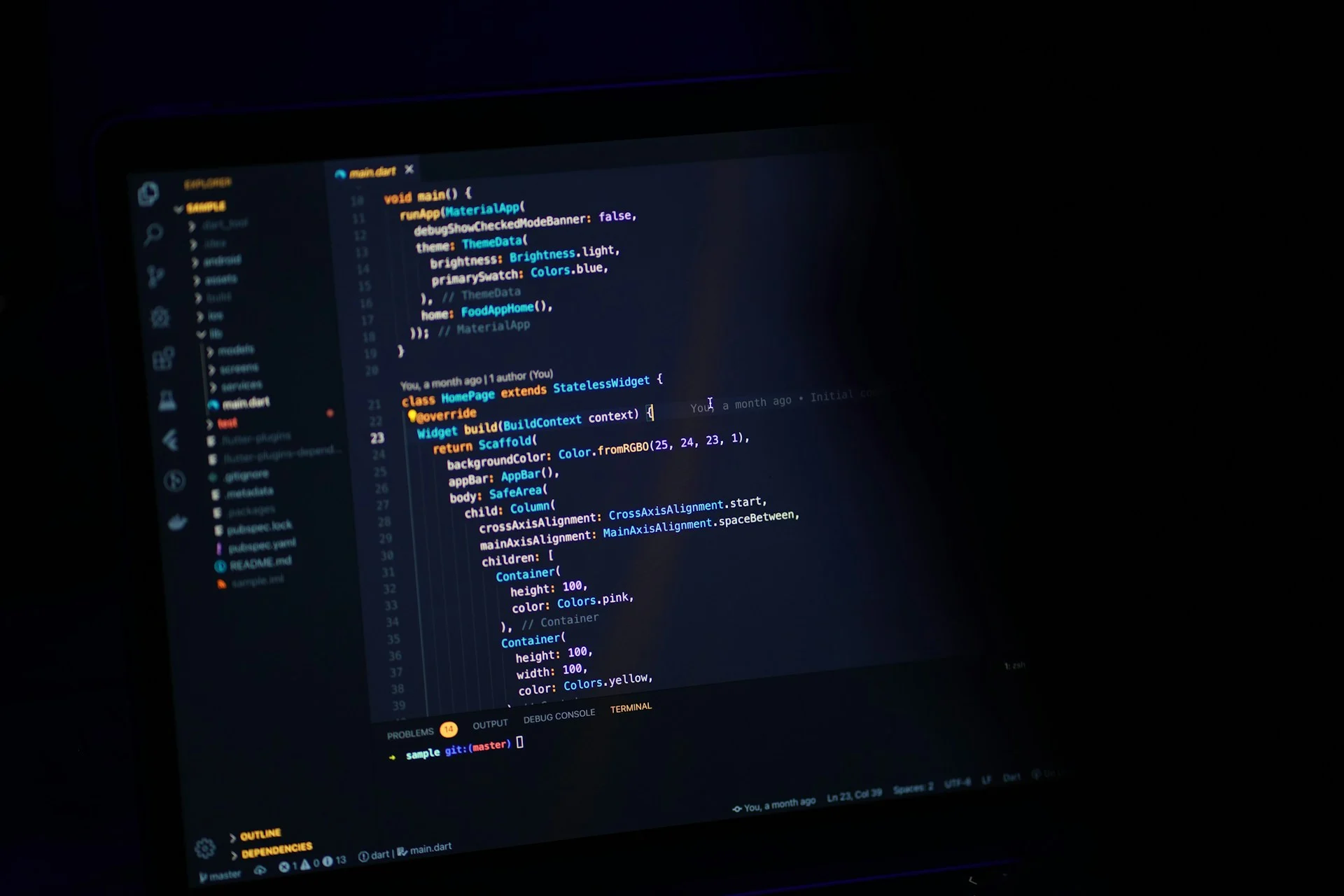 Dark laptop screen with code, representing an AI tool stack for developers