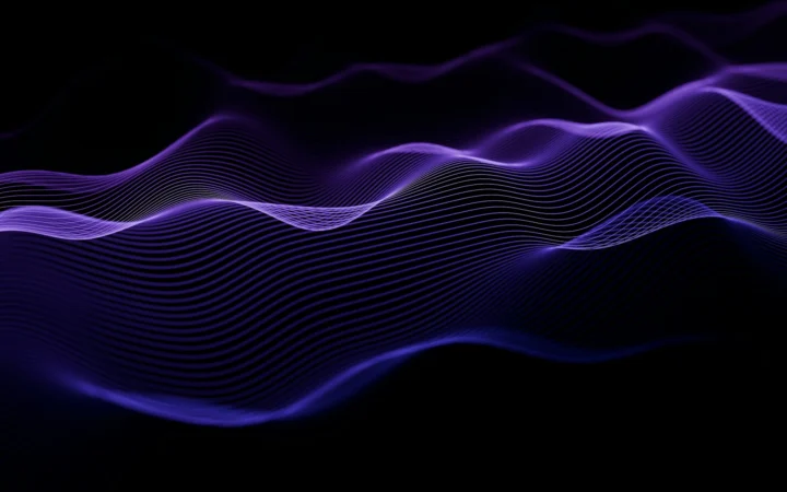 Liquid rippling under sound vibration in dramatic light, the idea behind the Apple Music rebrand