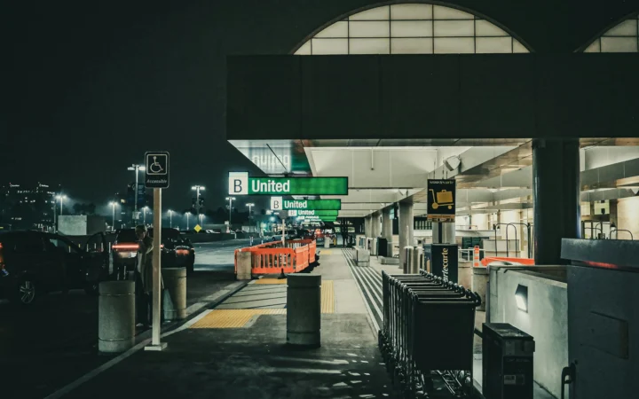 Empty airport terminal at dusk, reflecting ASUR Q3 traffic decline