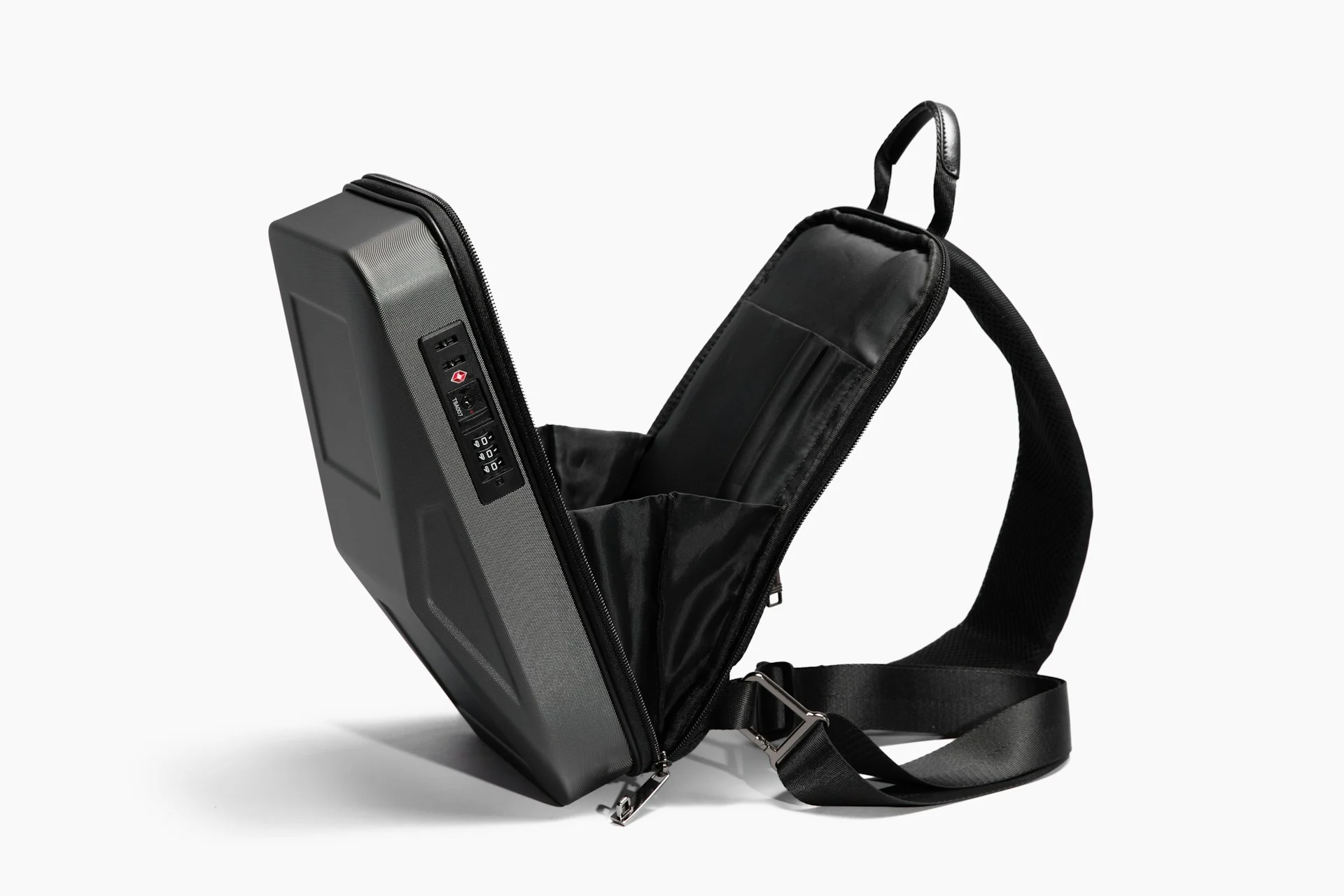 Open backpack packed with electronics and charging cables for the backpack charging hack