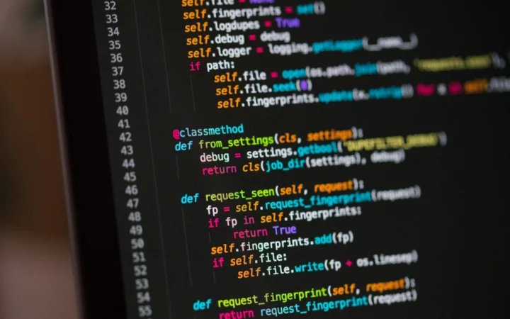 Lines of code glowing on a dark monitor, representing Biome 2.6.3 linting