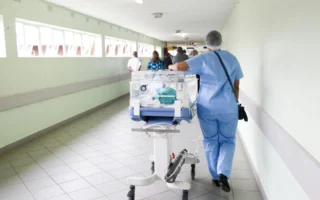 Modern hospital corridor representing the Bon Secours Surgery Partners deal