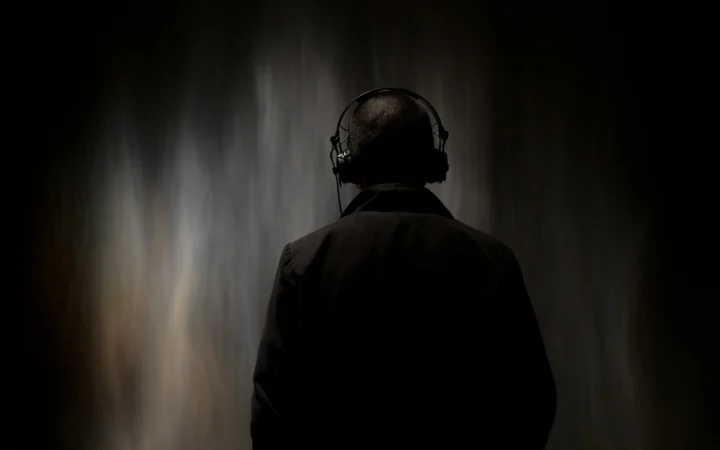 Over-ear headphones under dramatic light, illustrating the Bose buys Skullcandy deal