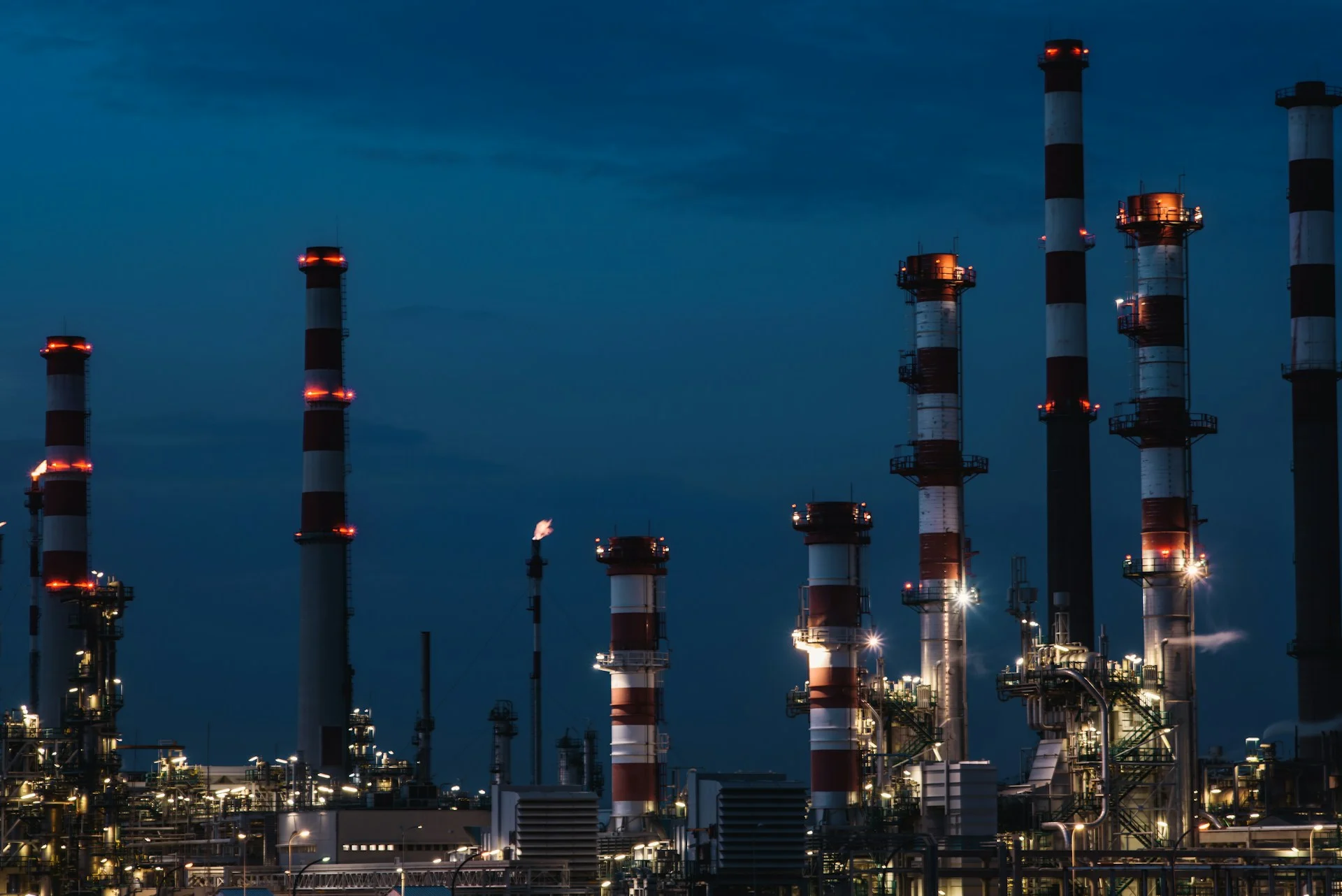 Oil refinery lit at night, illustrating the BPCL Q2 profit story