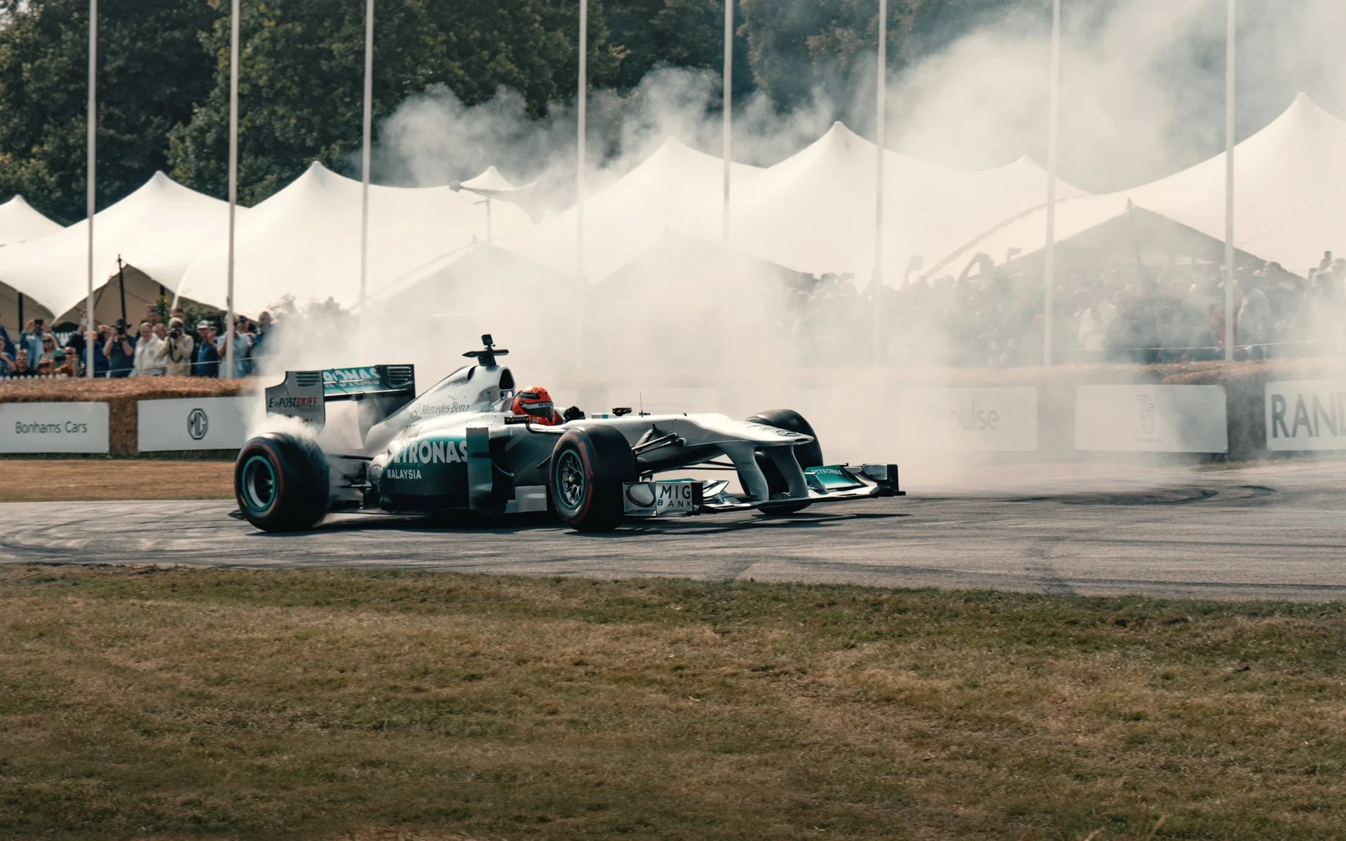 Formula 1 car racing under lights, symbolising F1 on Apple TV in the US
