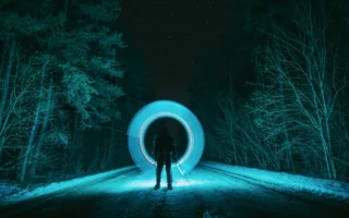 Glowing digital landscape representing a Genie 4 AI-generated world