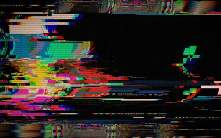 Computer screen with a vivid glitch distortion, illustrating Glitchrupt