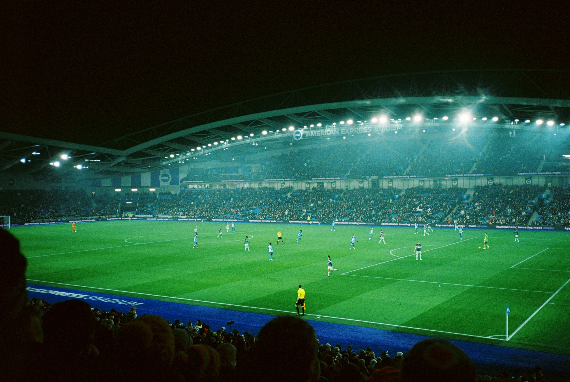 Football stadium floodlights lighting up the pitch, the stage for Messi's Ballon d'Or record