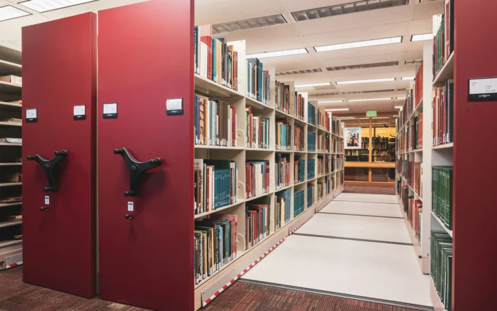 Archive shelves holding historical documents used by the Lighthouse chatbot