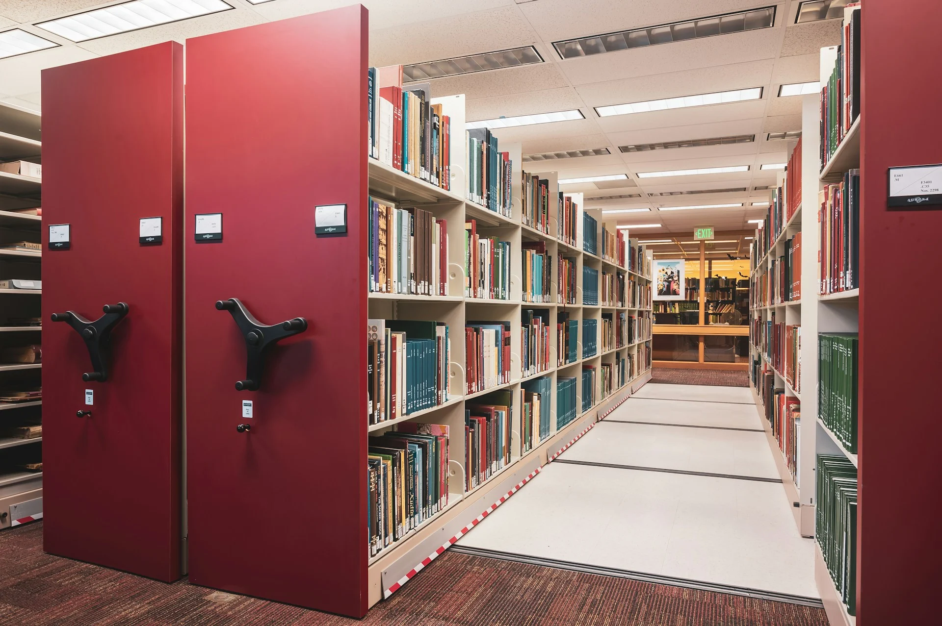 Archive shelves holding historical documents used by the Lighthouse chatbot