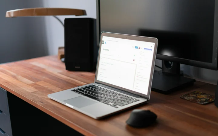 Silver laptop on a desk, similar to the M5 MacBook Air in the 1TB deal