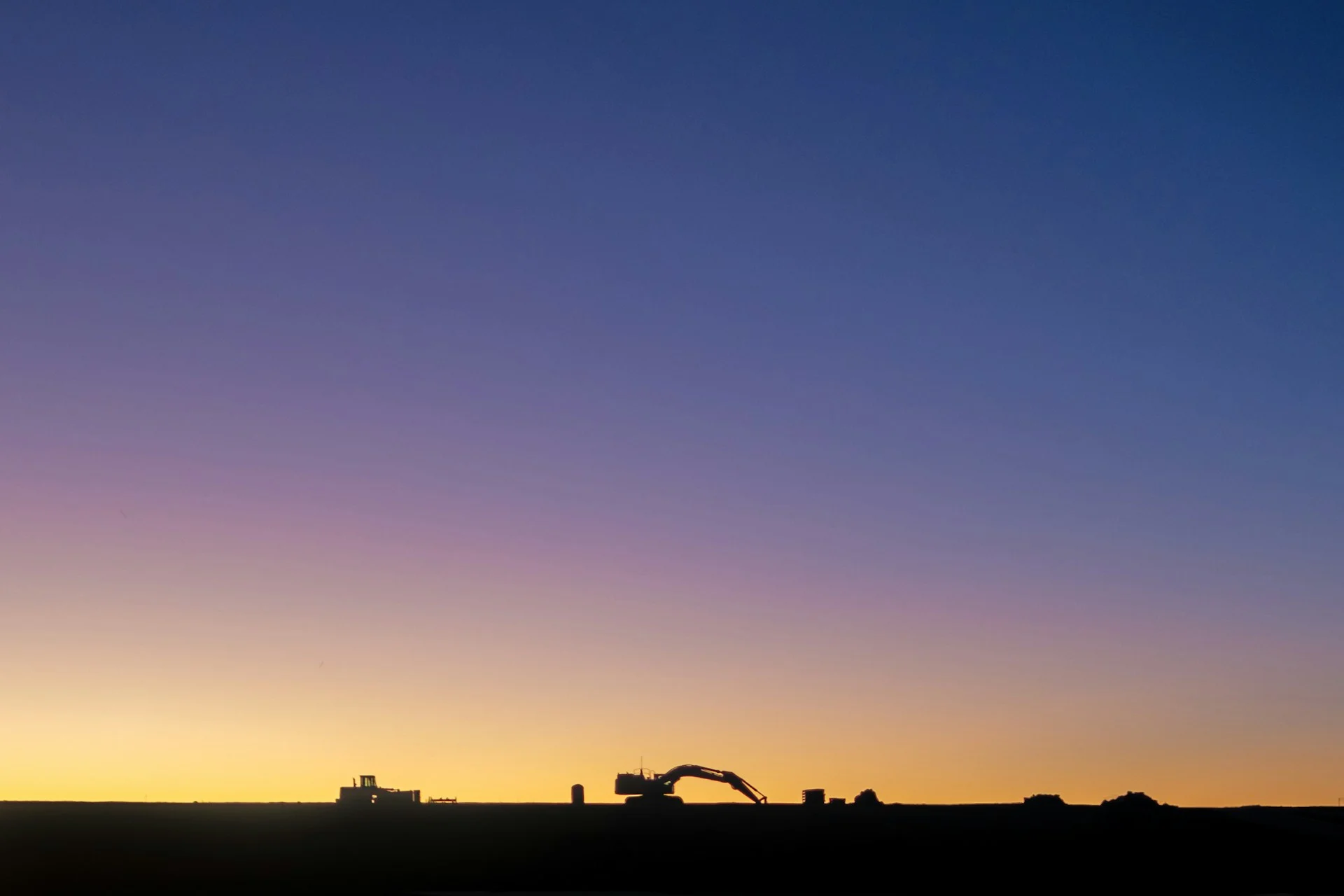 Pipeline construction at sunset, the kind of infrastructure work driving MBB Q3 earnings