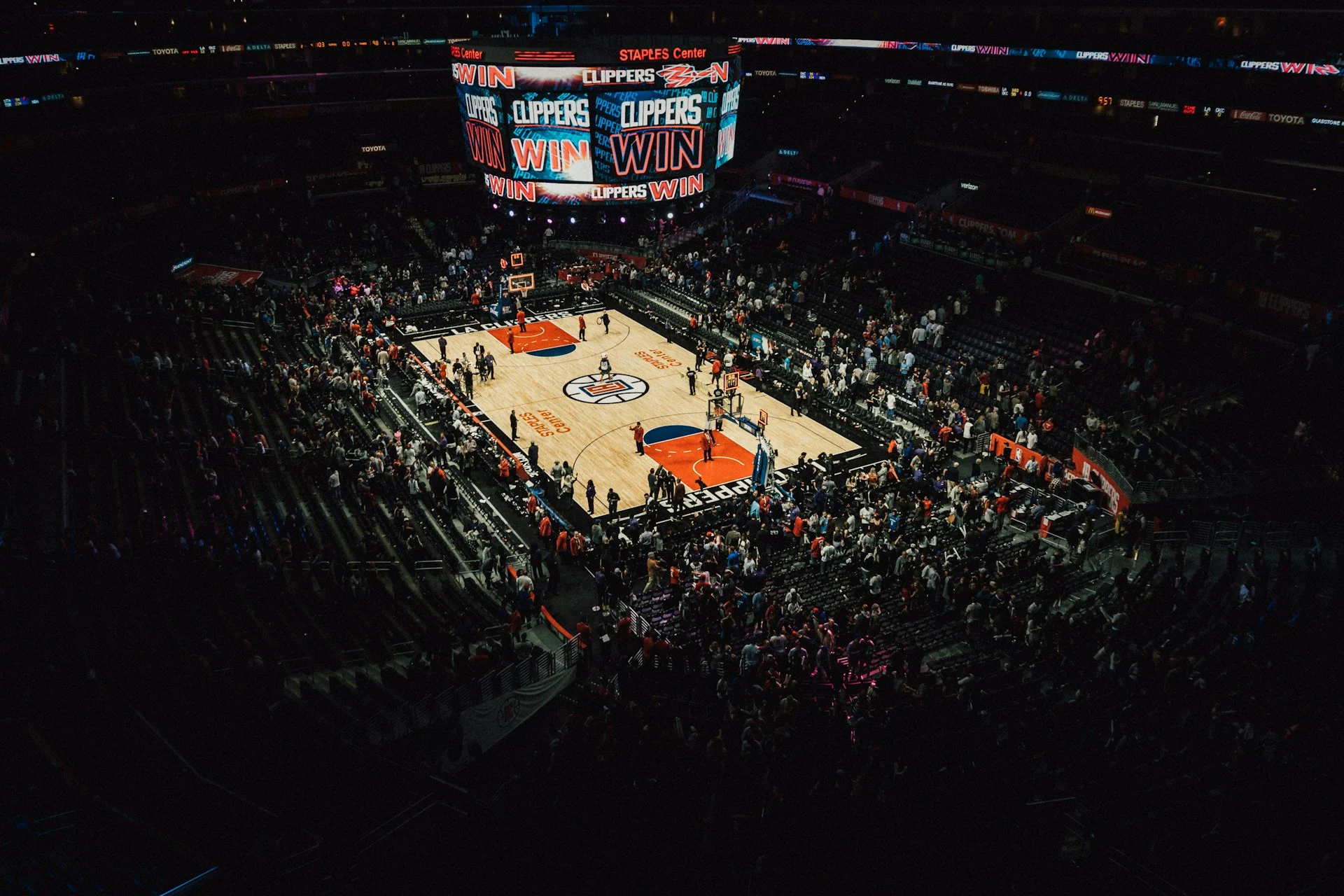 Basketball arena lit by floodlights, setting for the NBA prediction markets deal