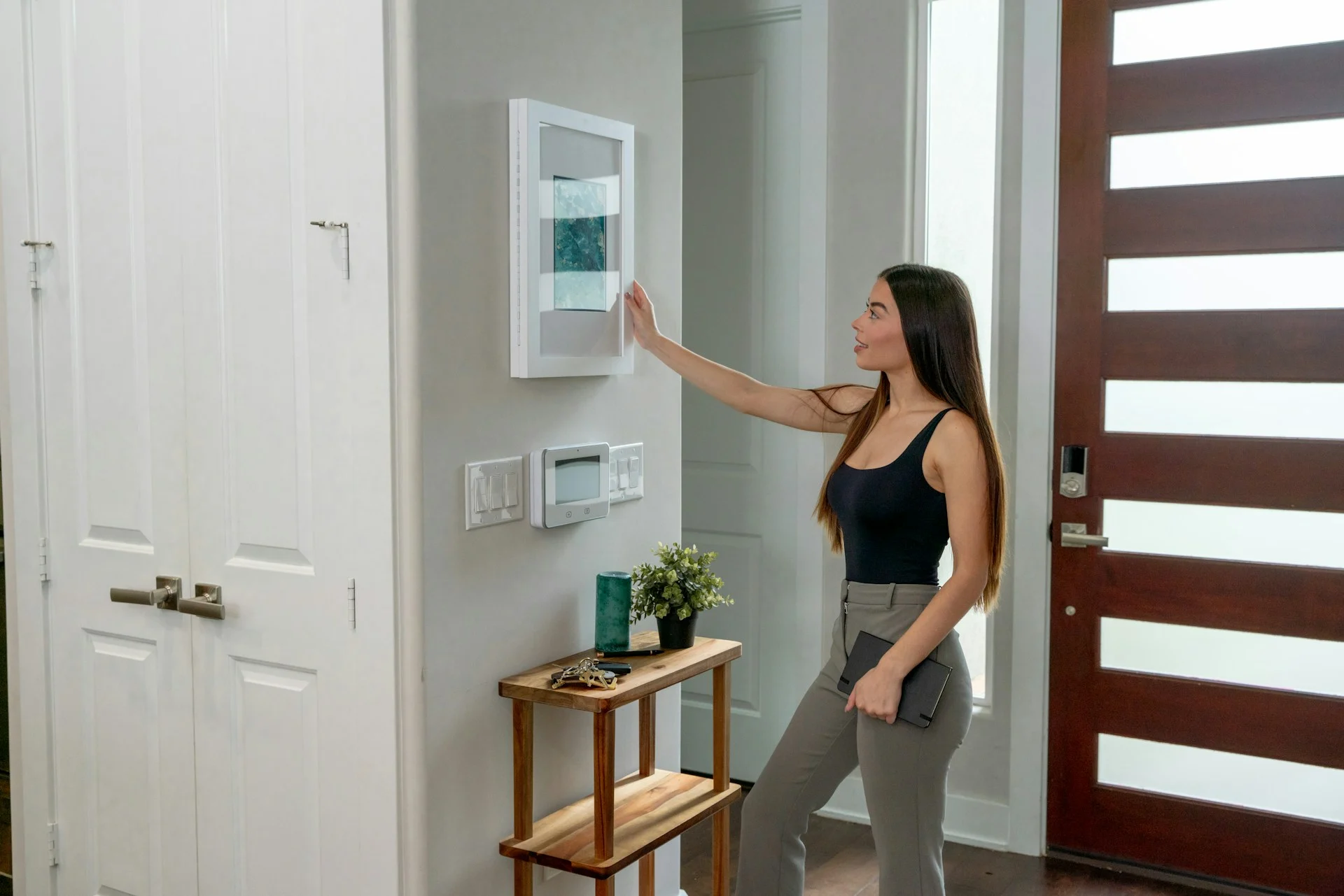 Old iPad as HomeView: a tablet mounted on a wall showing smart home controls
