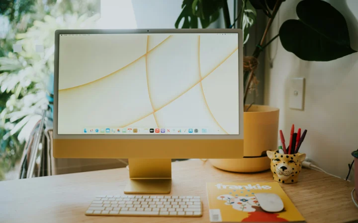 OLED iMac concept: desktop all-in-one computer on a desk