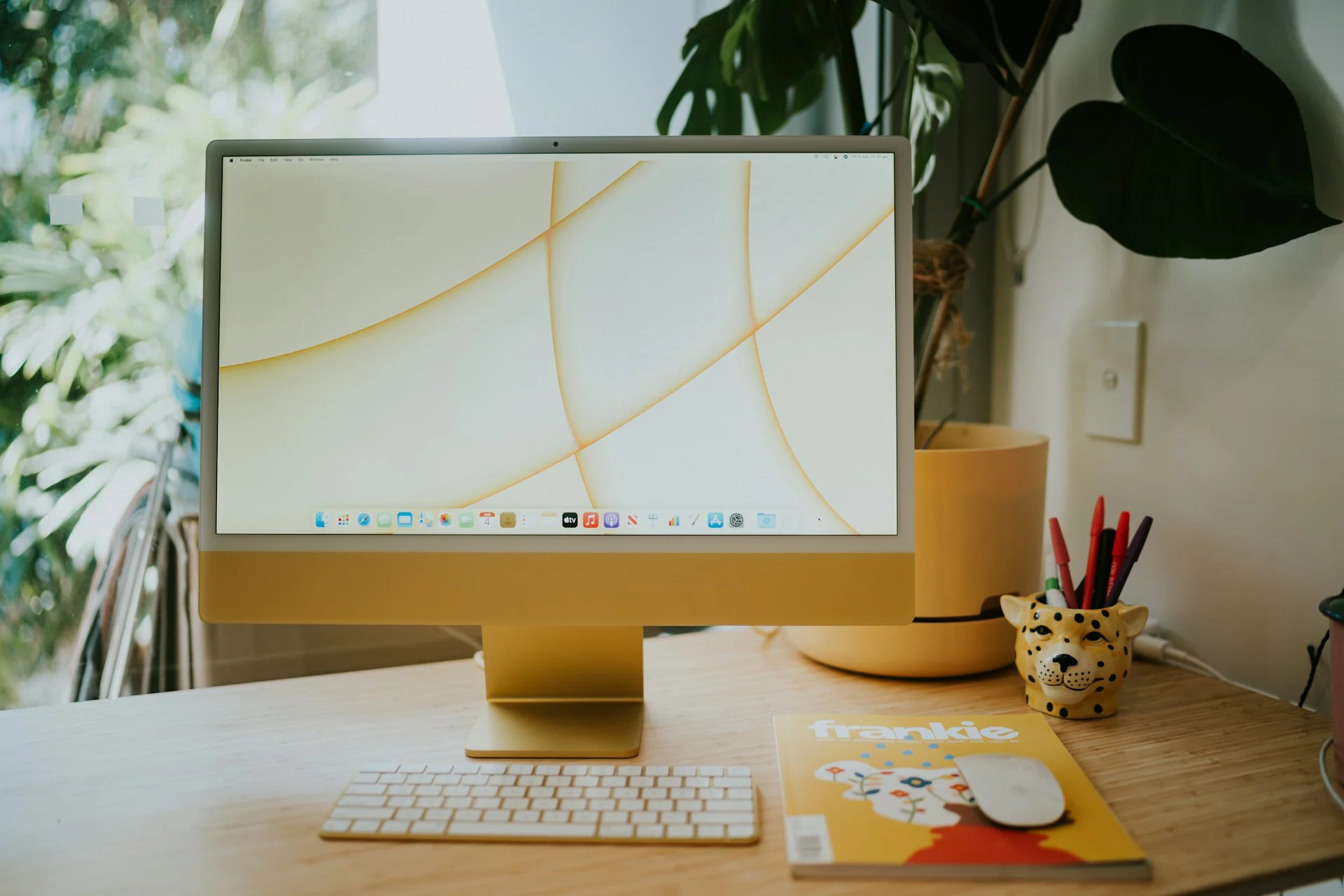 OLED iMac concept: desktop all-in-one computer on a desk