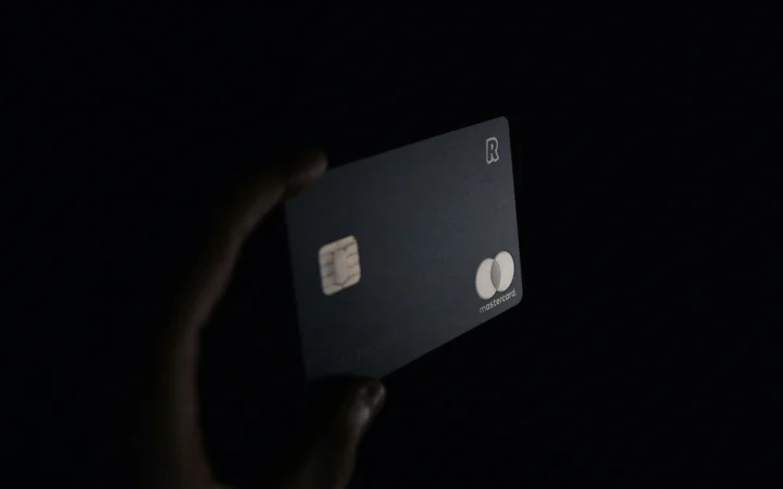 Credit card and bill in dramatic light, the start of a subscription audit