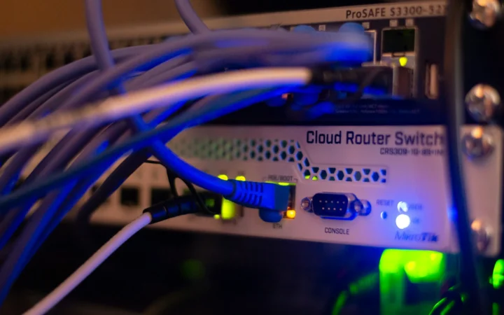 Server room lit in blue, representing Vercel Agent production access