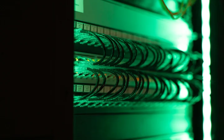 Data centre servers glowing blue, representing AI models on Vercel AI Gateway