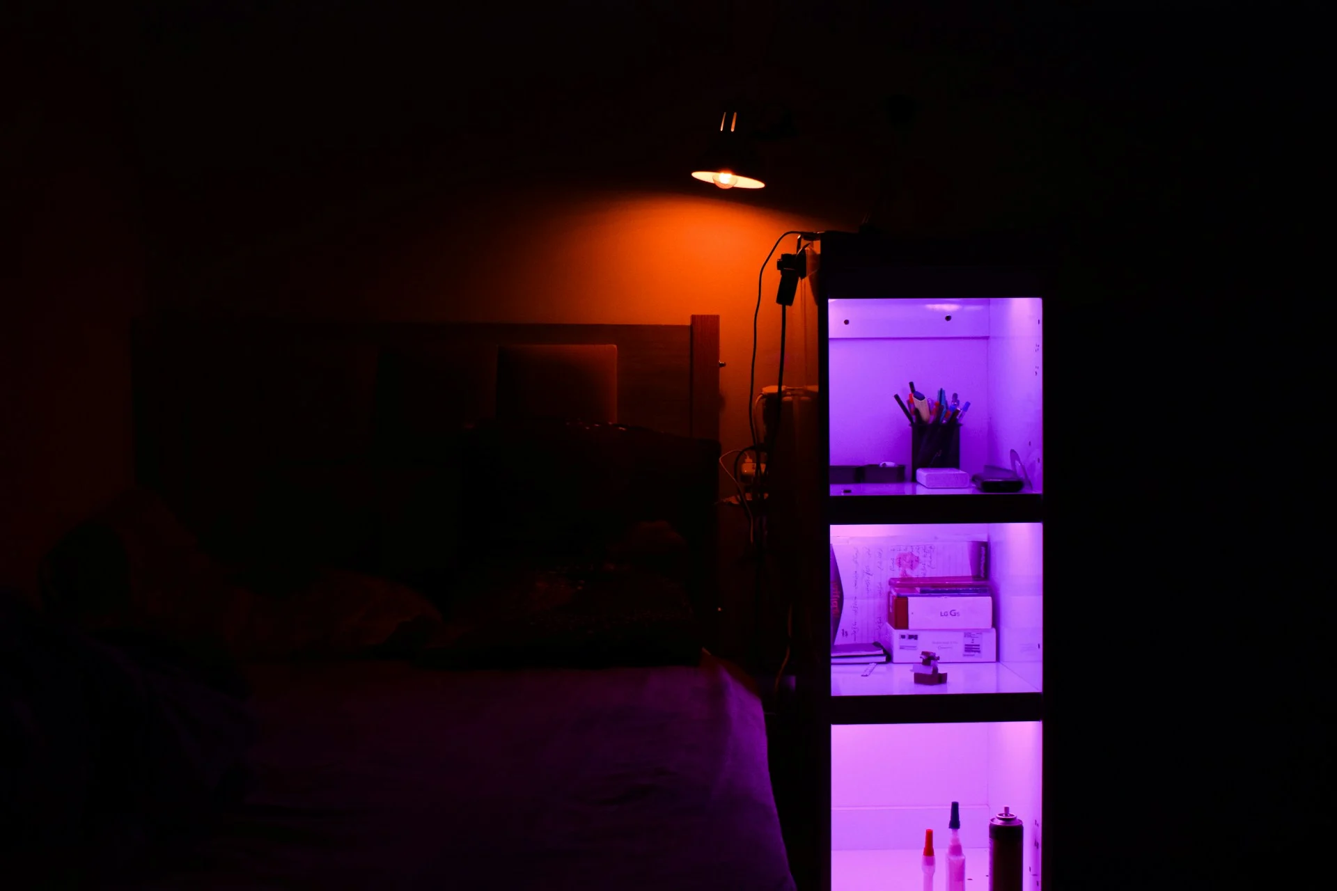 Glowing smartphone in a dark room, symbolising the vibe coding paradox